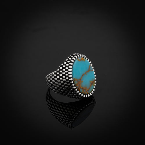 Sterling Silver Ring with Large Oval-shaped Antique Turquoise Gemstone